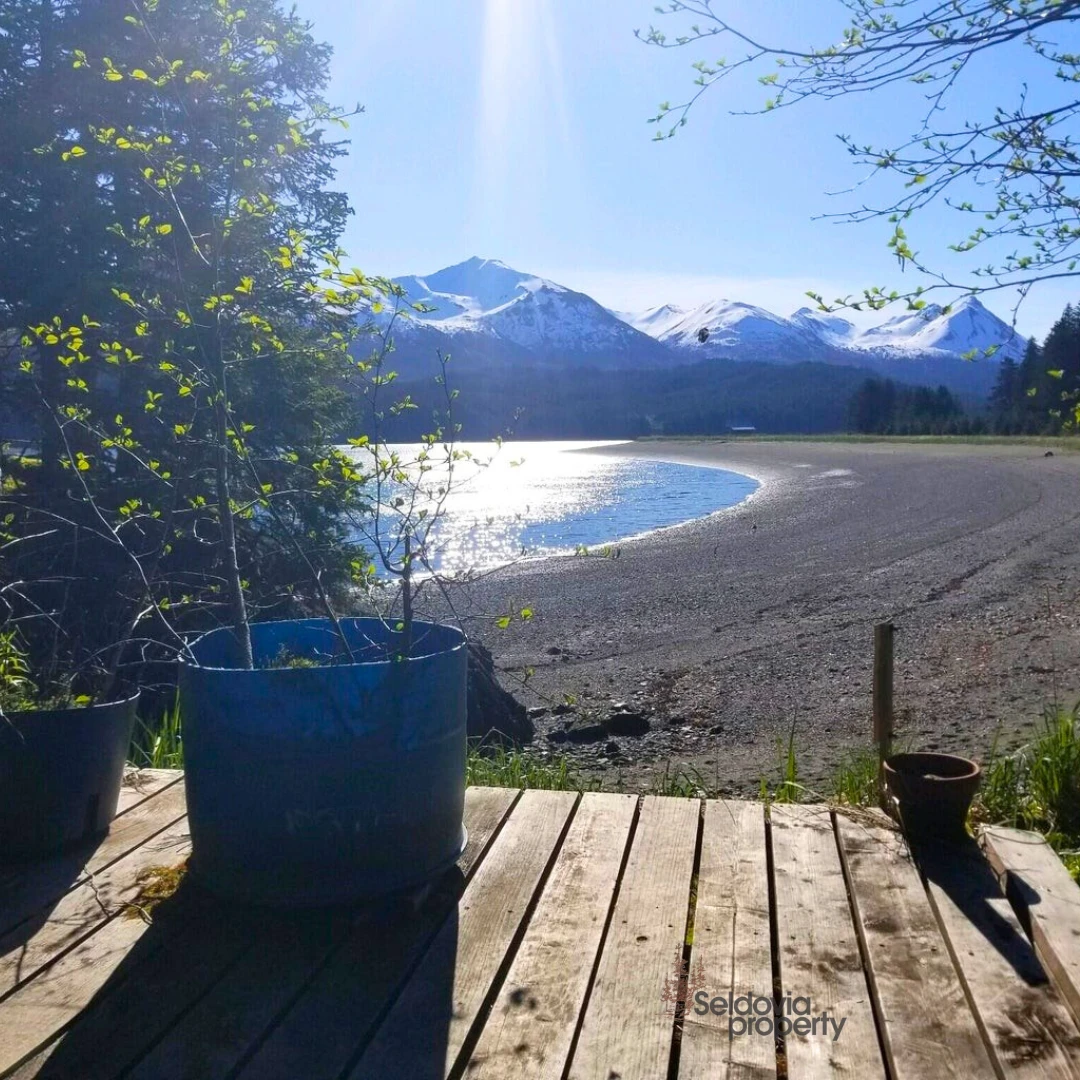 Look at this yoga deck or dreamy morning coffee spot at our Seldovia Bay listing! 